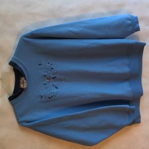 Woman's sweatshirt embroidery